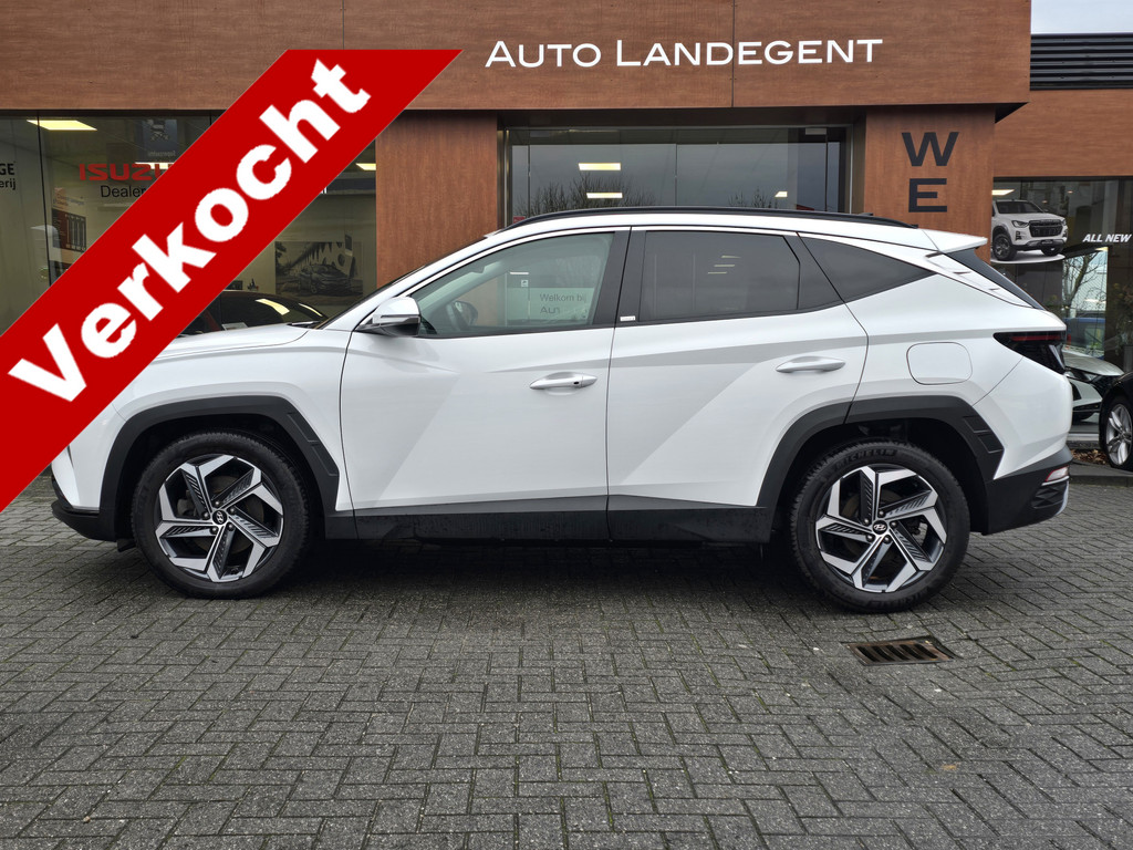 Hyundai Tucson 1.6 T-GDI PHEV Comfort Smart 4WD | Camera | Apple/ Android carplay | Adaptieve cruise | Stoel/stuur verwarming 49869122-0.jpg | Auto Flikweert